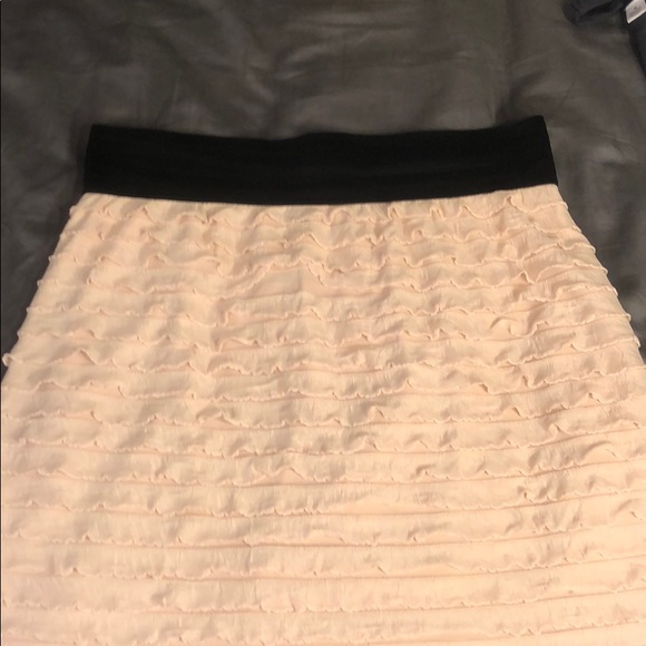 Express Dresses & Skirts - Mini cream colored skirt with ruffles
